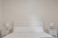 King size headboard with white leather capitone upholstery, white
