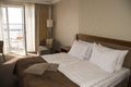 King sized bed in a luxury hotel room Royalty Free Stock Photo