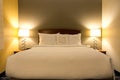 King sized bed in a luxury hotel room Royalty Free Stock Photo