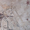 King Solomon sitting on his throne with a scepter in his hand, a gothic fresco from 1476