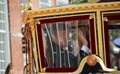 King Willem Alexander in Royal coach driving on Lange Voorhout on the Prince day Parade in The Hague Royalty Free Stock Photo