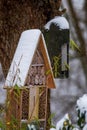 Insect hotel covered with snow, the Netherlands