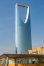 Kingdom Center tower or Burj Al Mamlaka glows a blue color  again blue sky Royalty Free Stock Photo