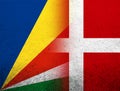 The Kingdom of Denmark National flag with The Republic of Seychelles National flag. Grunge Background