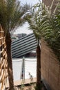 Kingdom of Saudi Arabia Expo 2020 Pavilion looking through palm trees and buildings