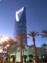 Kingdom Tower at twilight first lights and row of palms