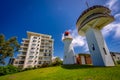 Kings Beach, Queensland, Australia - Two historic light house side by side next to holiday apartments Royalty Free Stock Photo