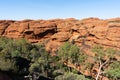 Kings canyon landscape with red sandstone domes and staircases pathway during the Rim walk in outback Australia Royalty Free Stock Photo