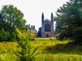 Kings College Chapel behind trees in Cambridge, United Kingdom