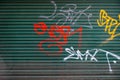 Graffiti Painted On A Locked Shop Or Store Security Shutter With No People