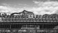 Black and White Image Luxury Apartments Or Flats Behind A Steel Railway Bridge Royalty Free Stock Photo