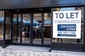 Empty Closed Commercial High Street Retail Shop Business Or Store To Let With No People Royalty Free Stock Photo