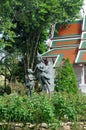 Kinnaree sculpture in flower garden of Phuping Rajanives, the main building of the Winter Palace