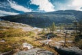 Kinsarvik, Hordaland, Norway. Young Woman Lady Tourist Traveler Backpacker Hiking In Hardangervidda Mountain Plateau Royalty Free Stock Photo