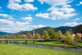 Kinzig River with church Saint Mauritius in Hausach Royalty Free Stock Photo