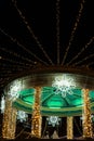 Kiosk in the castle square Pamplona Navarra Navarra spain illuminated at Christmas time. two people Royalty Free Stock Photo