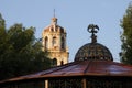 Kiosk and church tower at plaza Hidago in Coyoacan, Mexico