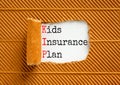 KIP kids insurance plan symbol. Concept words KIP kids insurance plan on beautiful white paper. Beautiful brown paper background.