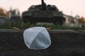 kippah cap in the Israeli flag style against background of a tracked tank. The concept of commemorating the victims of the