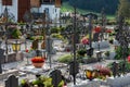 Kirchberg in Tirol, Tirol/Austria - September 18 2018: Local village graveyard next to the church with crosses candles and Royalty Free Stock Photo