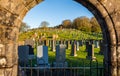 Kirkcudbright cemetery through the archway at the gate, Scotland Royalty Free Stock Photo