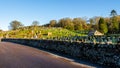 Kirkcudbright cemetery in the low sunlight of a winters morning Royalty Free Stock Photo