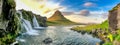 KIRKJUFELL, ICELAND - AUGUST 8, 2019: Kirkjufellfoss scenic spot with iconic waterfall and peak