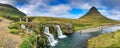 KIRKJUFELL, ICELAND - AUGUST 8, 2019: Kirkjufellfoss scenic spot with iconic waterfall and peak