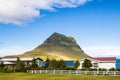 Kirkjufell, kirkjufellsfoss and atlantic ocean iceland in summer august