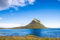 Kirkjufell, kirkjufellsfoss and atlantic ocean iceland in summer august