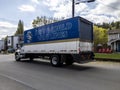 Kirkland, WA USA - circa April 2021: Angled view of a New World Van Lines moving truck in a residential neighborhood