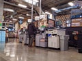 Self checkout counters being used by customers inside the new QFC grocery store off