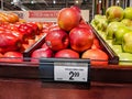 Cosmic Crisp hybrid apples for sale in the produce section inside a QFC grocery store