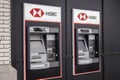 Kirkland, WA USA - circa July 2021: Angled view of an HSBC ATM machine on the side of a brick wall building in Totem Lake