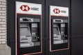 Kirkland, WA USA - circa July 2021: Angled view of an HSBC ATM machine on the side of a brick wall building in Totem Lake
