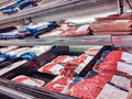 Raw, fresh red meat refrigerated section in a PCC Community Markets grocery store