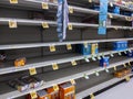 Kirkland, WA USA - circa October 2021: Angled view of low inventory in the snack aisle at SAfeway grocery store, during a back-to-