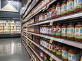 Kirkland, WA USA - circa September 2021: Angled view of jars of pasta in the pantry aisle inside a QFC grocery store