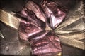 Kirlian glow on beautifully wrapped christmas gifts with ribbons