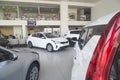 Kirov, Russia - April 12, 2022: Cars in showroom of dealership KIA in Kirov city