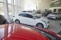 Kirov, Russia - April 12, 2022: Cars in showroom of dealership KIA in Kirov city
