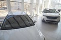 Kirov, Russia - April 12, 2022: Cars in showroom of dealership Kia in Kazan in country Russia. Partial focus