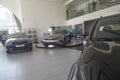 Kirov, Russia - April 12, 2022: Cars in showroom of dealership Kia in Kazan in country Russia