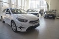 Kirov, Russia - April 12, 2022: Cars in showroom of dealership Kia in Kazan in country Russia. Partial focus