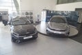 Kirov, Russia - April 12, 2022: Cars in showroom of dealership Kia in Kazan in country Russia. Partial focus