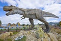 Sculpture of tyrannosaurus close-up. Thematic children`s park `Yurkin park`
