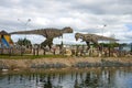 Tyrannosaurus Rex and carnotaurus. Sculptures of predatory dinosaurs in the children`s Park