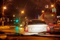 Kirov, Russia - December 30, 2017: Car in the night city. Colorful night traffic. Evening city with traffic lights