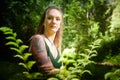 Kirov, Russia - June 29, 2022: Portrait of girl with Tattoo looking as peautiful seductive dryad. Pagan spirit of the