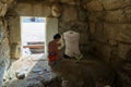 The figure of a gladiator praying before the battle, near the exit to the arena, in the ruins of the Beit Guvrin amphitheater, Royalty Free Stock Photo